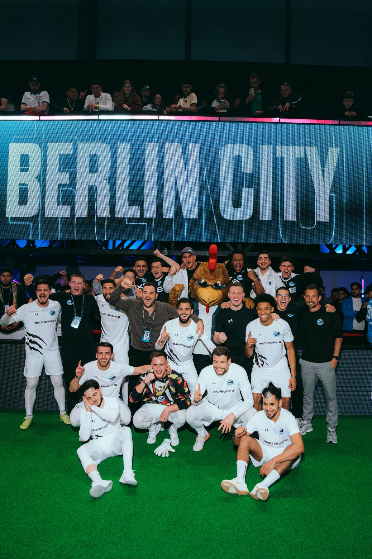 The LANCH team at the Icon League under the Berlin City sign