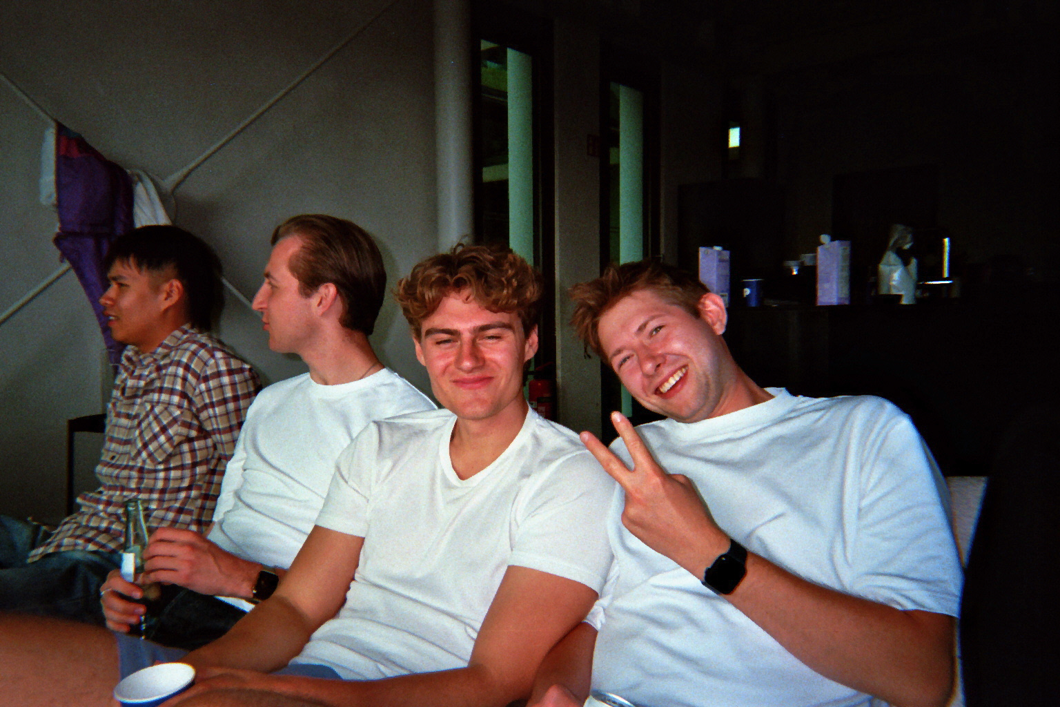 Colleagues laughing in the office lounge